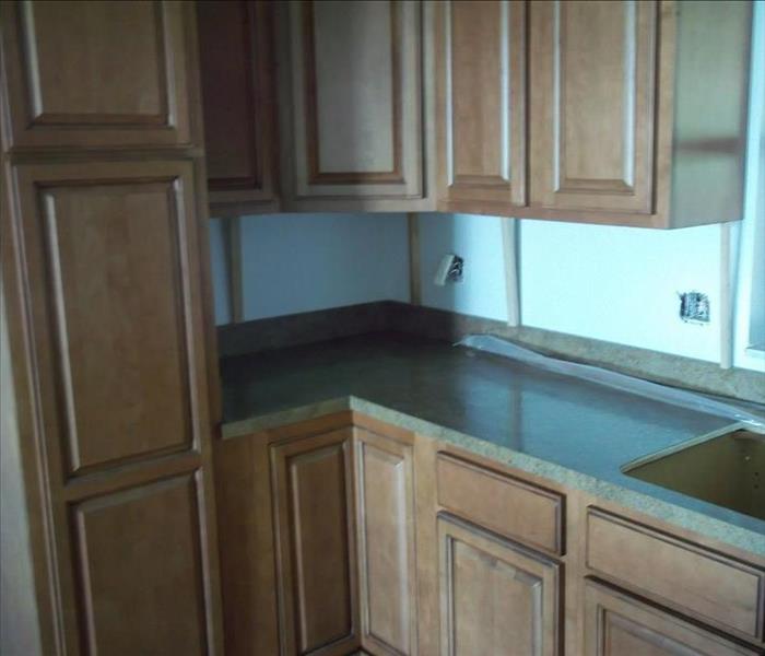 remodeled kitchen, new brown counters and formica countertops