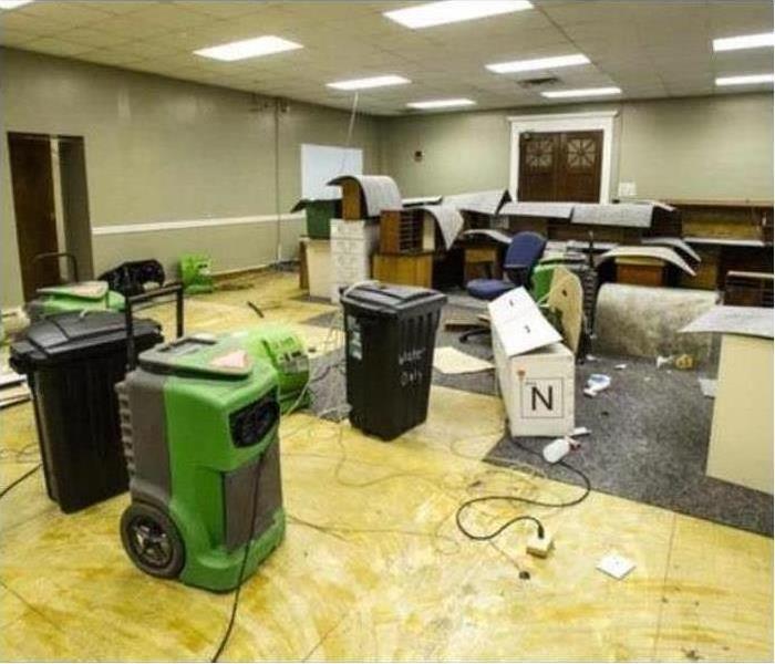 Hotel meeting room with SERVPRO drying equipment set up