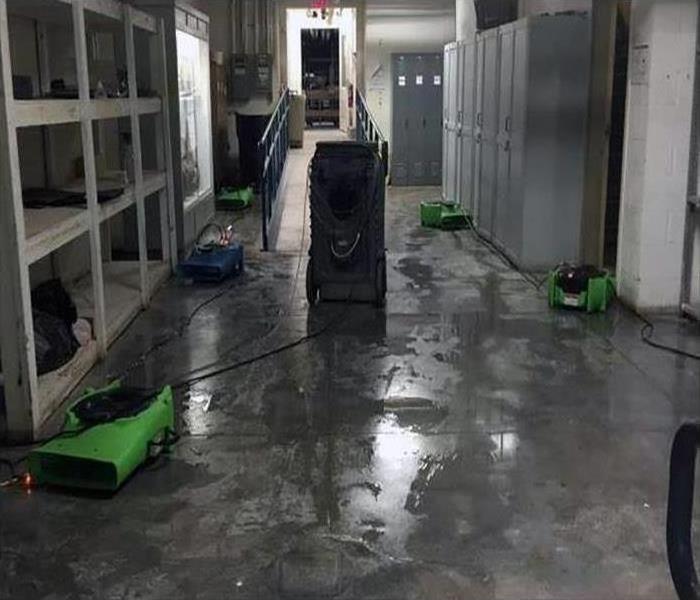 water damaged warehouse floors