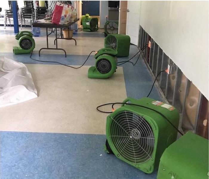 SERVPRO equipment set up in a water damaged cafeteria